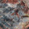 Ein geologisches Stück Gestein, das von kristallinen, farbigen Mineraladern durchzogen ist.